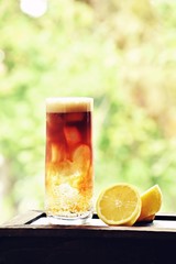 Espresso Tonic, refreshment summer drink with tonic water, lemon and coffee, copy space