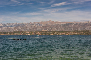 Fototapeta premium Velebit moutains and Adriatic Sea from Novigrad, Dalmatia, Croatia