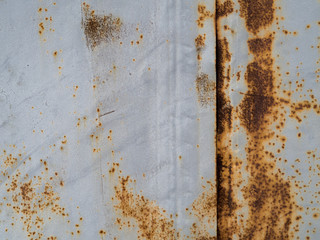 Dilapidated painted metal surface.