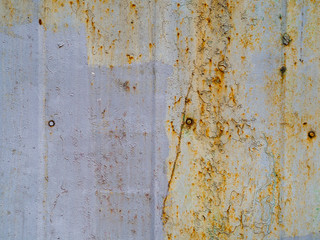Dilapidated painted metal surface.