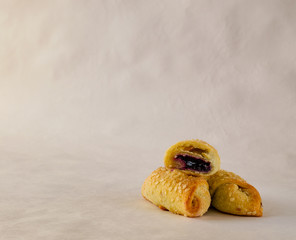 Three croissants on white background