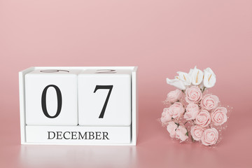 December 07th. Day 7 of month. Calendar cube on modern pink background, concept of bussines and an importent event.
