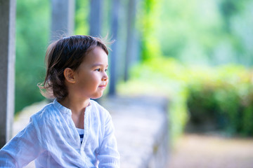 Little girl with white shirt having fun