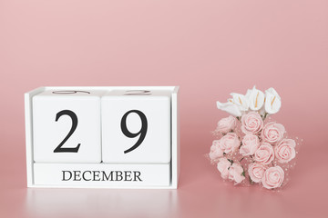 December 29th. Day 29 of month. Calendar cube on modern pink background, concept of bussines and an importent event.