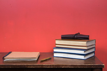 table with books and other elements