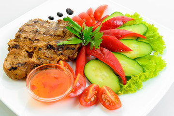 steak meat prepared with fresh vegetables 