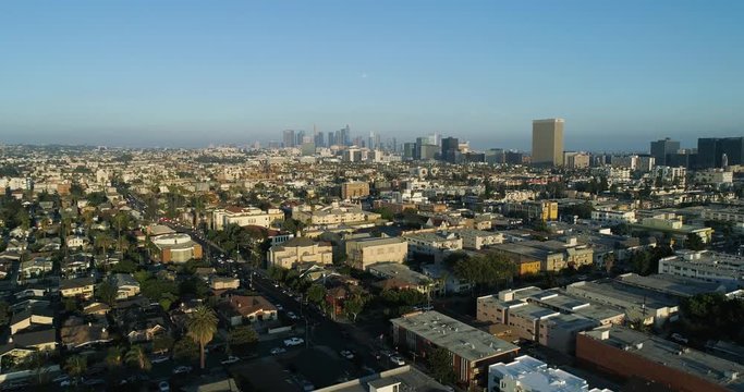 Aerial view of Los Angeles, California. Downtown LA in 4K, Slow Motion, Natural light. Airflow Creations. Modern cityscape in USA. Buidings and palm trees.