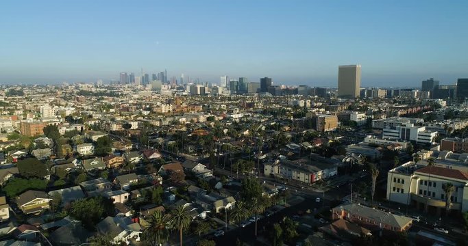 AERIAL LOS ANGELES: Downtown LA at golden hour on a slow motion long shot. LA's skyline in vibrant color. Drone shot in California by Airflow Creations. 