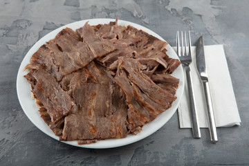 Turkish Doner Kebab on plate. Arabic traditional doner with pita bread / lavash. Protein nutrition,...
