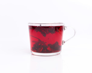 hibiscus tea in the glass cup isolated on white background