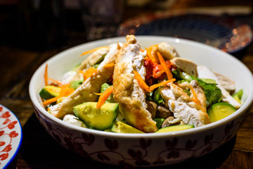 Barbecued chicken and avocado salad.