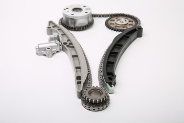 set of car engine timing chain isolated on white background. the gear of crankshaft in system of gas distribution mechanism on white background. timing kit of a car engine