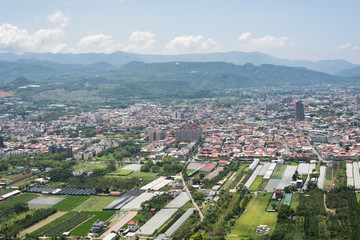 cityscape of Puli township with clouds under sky