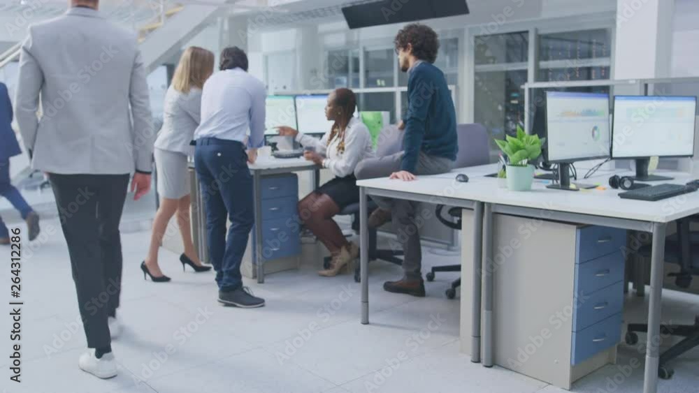 Poster in bright busy office group of young professionals have team building meeting. standing at the desk,