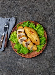 PERUVIAN CHILEAN traditional dish PAPA RELLENA meat stuffed mashed potato on wooden plate