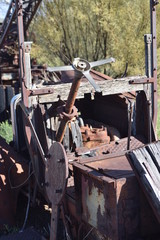 Abandoned, rusted-out vintage automobiles and trucks.