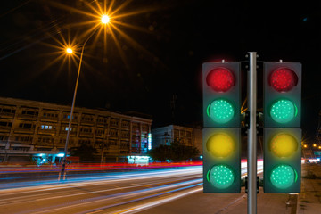 Traffic light red green car parked from behind the white background.