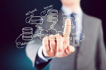 Businessman and internet and virtual reality concept - businessman pressing button on virtual screens