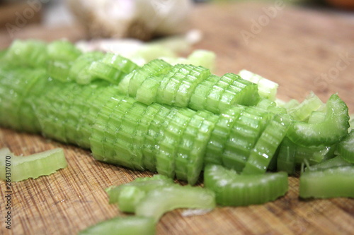 Macro sliced celery, sliced celery on chopping board
