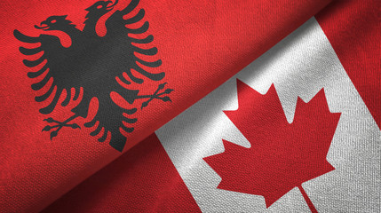 Albania and Canada two flags textile cloth, fabric texture