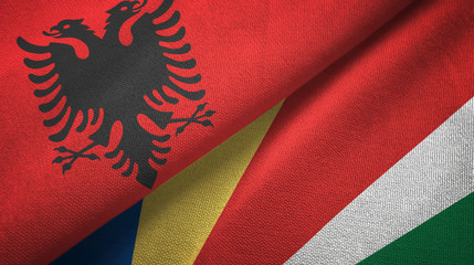 Albania and Seychelles two flags textile cloth, fabric texture
