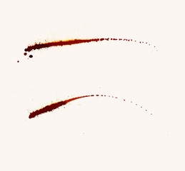 artificial blood splatters on white background