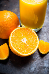 Sweet juicy oranges on the rustic background. Selective focus. Shallow depth of field. 