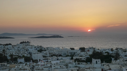sunset view of the town of chora on mykonos