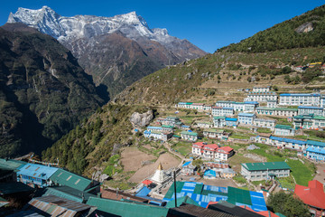 View of Namche Bazaar and Kongde Ri (6,187 metres) at behind. Namche Bazaar is the staging point for expeditions to Everest and other Himalayan peaks in the area.
