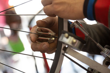 Where we are servicing the wheels of a sports bicycle
