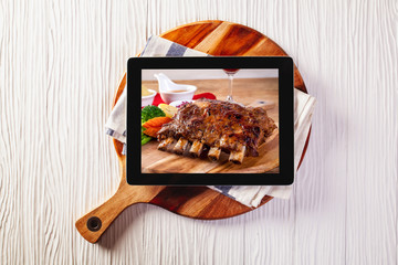Food delivery concept with a digital tablet