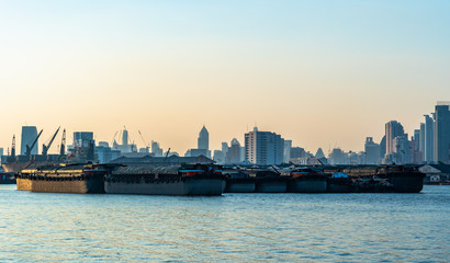 Naklejka premium Landscape of Bangkok City Thailand inside the river at sunset