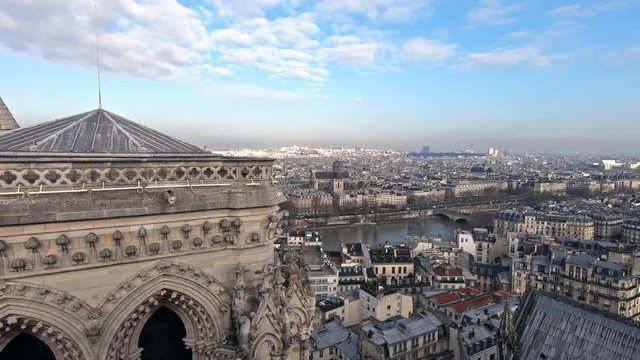 4K, Elevated view of Paris and Seine river from Notre Dame Cathedral on winter day, observing the city from the top of the church. Famous touristic places and popular travel destinations in Europe-Dan