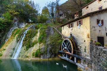 Ancient watermill wheel, Molinetto della Croda in Lierza valley. Refrontolo. Italy