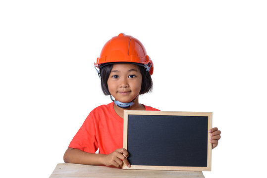 Asian children wearing safety helmet and smiling with chalkboard isolated on white background. Kids and education concept
