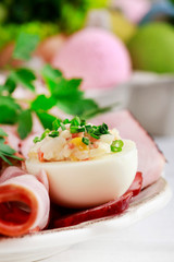 Stuffed egg on easter table.