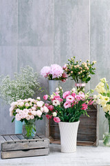 Bouquets of colorful flowers. Peony, rose, lisianthus, gypsophila paniculata.