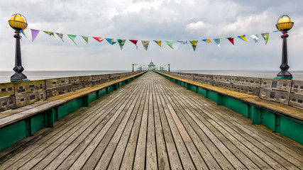 Beautiful view over the pier of Clevedon in Somerset south of Bristol at the channel with nice clouds.