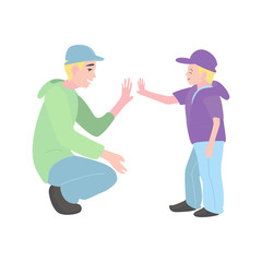 father and son clap their hands. A man with a little boy.