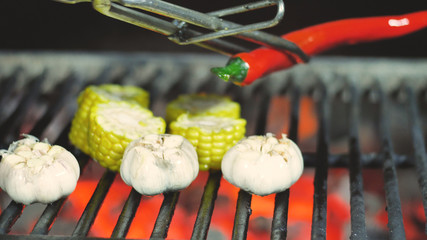 Grilled vegetables corn garlic and chili pepper, garnish restaurant cooking