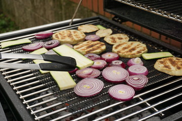 Grilling vegetables on a outdoor barbecue