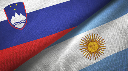 Slovenia and Argentina two flags textile cloth, fabric texture