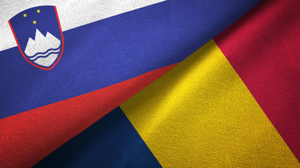 Slovenia and Chad two flags textile cloth, fabric texture