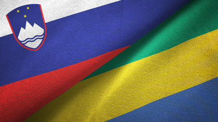 Slovenia and Gabon two flags textile cloth, fabric texture