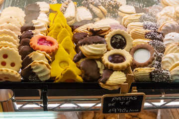 Pastas de te, tea cookies, on display at a food market in Spain