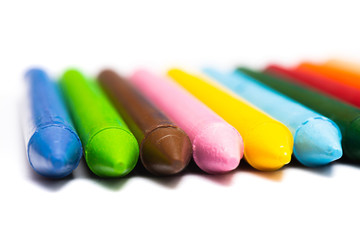 Colorful wax crayons collection isolated on white background. Colorful multi colored crayons for school ,kids and professional use.
