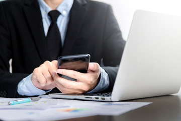smart phone holding in businessman hands. Blurred background. Horizontal mockup