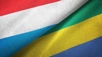 Luxembourg and Gabon two flags textile cloth, fabric texture