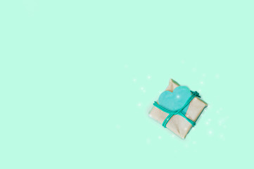 gift box with a blue heart on a blue background