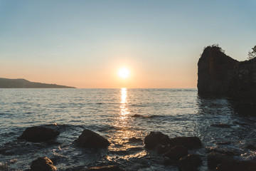 Beautiful colorful sunset at the sea sun shining. Panoramic view. Beauty world natural outdoors...